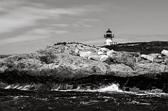 Rock Shoreline by Pond Island Lighthouse in Maine - BW